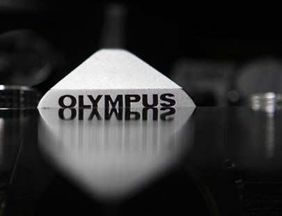 The Olympus logo on its camera is seen in this illustrative photograph taken in Tokyo The Olympus logo on its camera is seen in this illustrative photograph taken in Tokyo