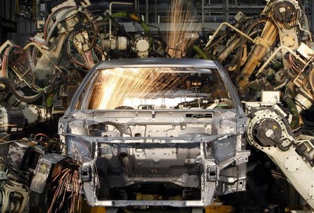 Robots weld the bodyshell of a Toyota Camry Hybrid car on the assembly line at the Toyota plant in Melbourne Robots weld the bodyshell of a Toyota Camry Hybrid car on the assembly line at the Toyota plant in Melbourne