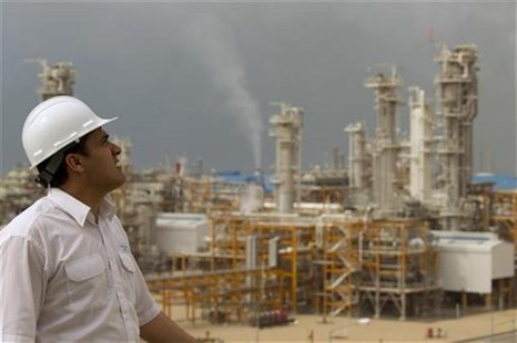 An engineer looks at the Phase 4 and Phase 5 gas refineries in Assalouyeh An engineer looks at the Phase 4 and Phase 5 gas refineries in Assalouyeh