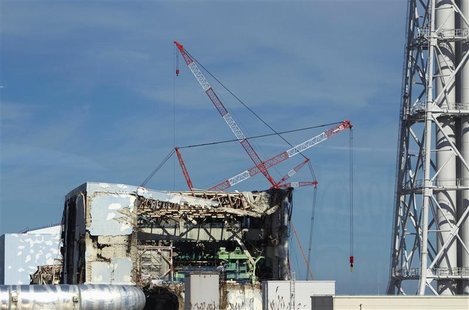 The crippled Fukushima Daiichi nuclear power plant is seen from bus windows in Fukushima The crippled Fukushima Daiichi nuclear power plant is seen from bus windows in Fukushima