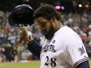 Milwaukee Brewers first baseman Prince Fielder walks back to the dugout after grounding out to the St. Louis Cardinals in the 8th inning in 