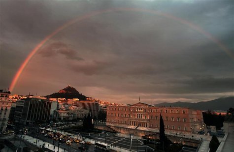 A rainbow appears over the Greek parliament in Athens's Syntagma square A rainbow appears over the Greek parliament in Athens's Syntagma square