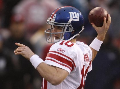 New York Giants quarterback Manning throws a pass against the San Francisco 49ers in the first quarter during the NFL's NFC Championship gam New York Giants quarterback Manning throws a pass against the San Francisco 49ers in the first quarter during the NFL's NFC Championship gam