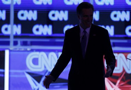 Republican presidential candidate Massachusetts Governor Mitt Romney leaves his podium during a break in the Republican presidential candida Republican presidential candidate Massachusetts Governor Mitt Romney leaves his podium during a break in the Republican presidential candida