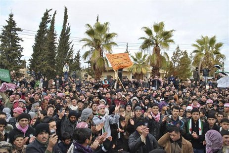 Demonstrators protest against Syria's President Bashar al-Assad in Jerjenaz, near Idlib Demonstrators protest against Syria's President Bashar al-Assad in Jerjenaz, near Idlib
