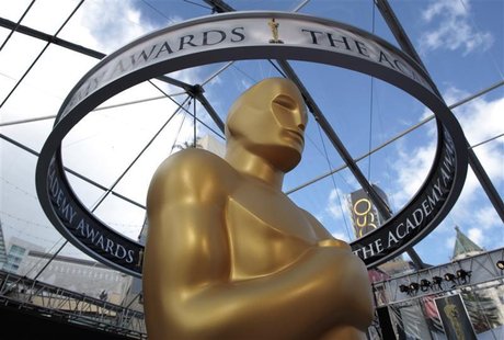 An Oscar statue is seen beneath plastic sheeting during preparations for the 83rd Academy Awards in Hollywood An Oscar statue is seen beneath plastic sheeting during preparations for the 83rd Academy Awards in Hollywood