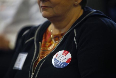 A woman listens as Republican presidential candidate Newt Gingrich attends the South Carolina Tea Party Convention in Myrtle Beach A woman listens as Republican presidential candidate Newt Gingrich attends the South Carolina Tea Party Convention in Myrtle Beach