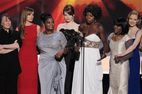 The cast of "The Help" accept the award for outstanding performance by a cast in a motion picture at the 18th annual Screen Actors Guild Awards in Los Angeles, California January 29, 2012.
REUTERS/Lucy Nicholson The cast of "The Help" accept the award for outstanding performance by a cast in a motion picture at the 18th annual Screen Actors Guild Awards in Los Angeles, California January 29, 2012.
REUTERS/Lucy Nicholson