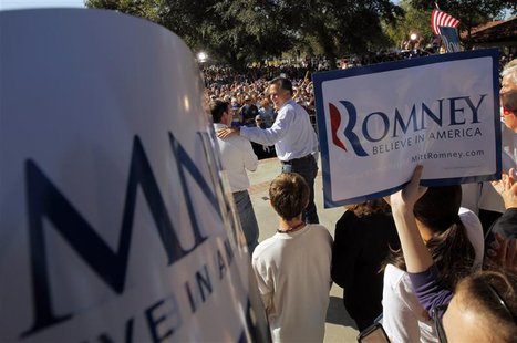 Republican presidential candidate and former Massachusetts Governor Romney takes the stage at a campaign rally in Dunedin Republican presidential candidate and former Massachusetts Governor Romney takes the stage at a campaign rally in Dunedin