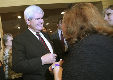 Republican presidential candidate and former Speaker of the House Newt Gingrich greets people at Fred's Southern Kitchen in Plant City, Flor Republican presidential candidate and former Speaker of the House Newt Gingrich greets people at Fred's Southern Kitchen in Plant City, Flor