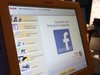 A Facebook logo is displayed on Kodak photo kiosk during the 2012 International Consumer Electronics Show (CES) in Las Vegas