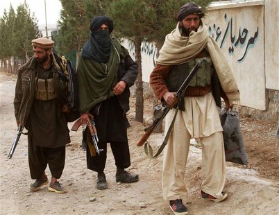 Taliban militants hand over their weapons after joining the Afghan government's reconciliation and reintegration program, in Herat Taliban militants hand over their weapons after joining the Afghan government's reconciliation and reintegration program, in Herat