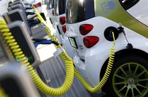 Electric smart compact cars of German car manufacturer Mercedes are lined up at a charging station during the International Motor Show in Fr Electric smart compact cars of German car manufacturer Mercedes are lined up at a charging station during the International Motor Show in Fr