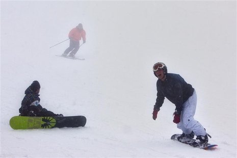 Holiday-makers ski and snowboard on Mount Hermon in the Golan Heights, some 500 metres from Israel's border with Syria Holiday-makers ski and snowboard on Mount Hermon in the Golan Heights, some 500 metres from Israel's border with Syria
