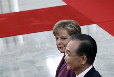 German Chancellor Merkel walks next to Chinese Premier Wen during an official welcoming ceremony in the Great Hall of the People in Beijing German Chancellor Merkel walks next to Chinese Premier Wen during an official welcoming ceremony in the Great Hall of the People in Beijing