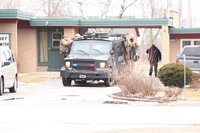 Swat team outside of motel
