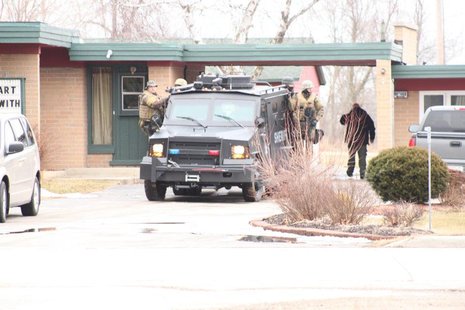 Swat team outside of motel