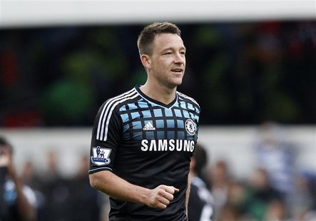 John Terry of Chelsea celebrates after his team beat Queens Park Rangers in their FA Cup soccer match at Loftus Road in London John Terry of Chelsea celebrates after his team beat Queens Park Rangers in their FA Cup soccer match at Loftus Road in London