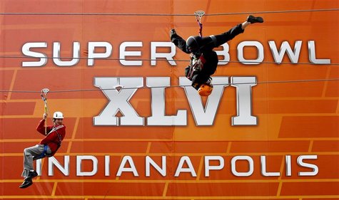 Fans ride on a zip line in downtown Indianapolis, ahead of the NFL's Super Bowl XLVI football game Fans ride on a zip line in downtown Indianapolis, ahead of the NFL's Super Bowl XLVI football game