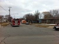 Police and rescue personnel at a residence on Erie Street in De Pere on Friday Feb. 3, 2012. (photo taken by reporter Terry Lee)
