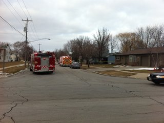 Police and rescue personnel at a residence on Erie Street in De Pere on Friday Feb. 3, 2012. (photo taken by reporter Terry Lee)