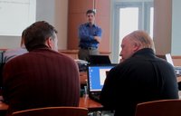 Two Collaborative Consulting confer during an orientation class at the technology firm's new office in downtown Wausau