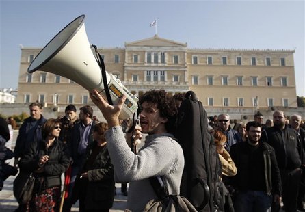 Protesters from PAME march during a rally in front of the parliament in Athens Protesters from PAME march during a rally in front of the parliament in Athens