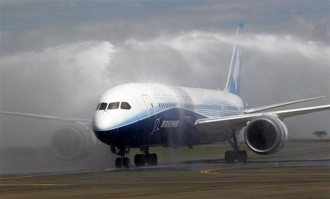 The Boeing Dreamliner 787-800 is hosed down after making its first landing at the Jomo Kenyatta airport in Kenya's capital Nairobi The Boeing Dreamliner 787-800 is hosed down after making its first landing at the Jomo Kenyatta airport in Kenya's capital Nairobi