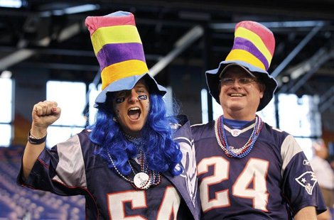 New England Patriots fans enjoy themselves inside Lucas Oil Stadium before the start of the NFL Super Bowl XLVI football game against the Ne New England Patriots fans enjoy themselves inside Lucas Oil Stadium before the start of the NFL Super Bowl XLVI football game against the Ne