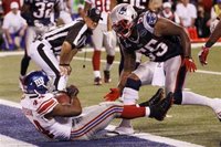 The Giants score the winning touchdown in the Super Bowl in Indianapolis (Reuters)