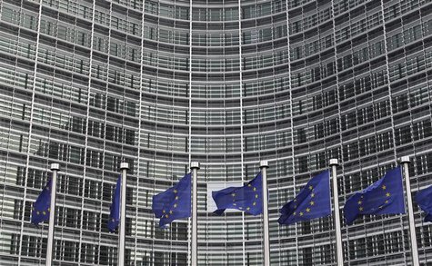 EU flags are seen outside the EU Commission headquarters in Brussels EU flags are seen outside the EU Commission headquarters in Brussels