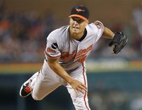Orioles pitcher Guthrie throws to the Tigers during the forth inning in their MLB American League baseball game in Detroit
