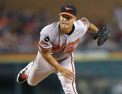 Orioles pitcher Guthrie throws to the Tigers during the forth inning in their MLB American League baseball game in Detroit