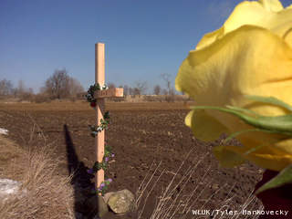 A makeshift memorial can be seen along Highway 67 in the town of Ashford.  (Photo courtesy of Fox 11 WLUK-TV)