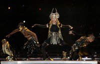 Madonna performs during the halftime show at the NFL Super Bowl XLVI football game between the New York Giants and the New England Patriots 