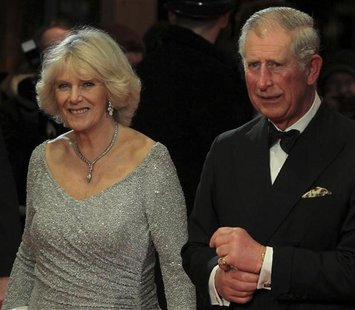 Britain's Prince Charles and his wife Camilla, Duchess of Cornwall, arrive at The Royal Premiere of director Martin Scorsese's film Hugo at 