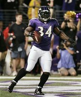 Ravens' Williams stands in the end zone after scoring a touchdown against the Texans in their NFL football game in Baltimore