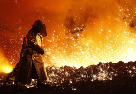 A worker controls the cast at a blast furnace of German steel manufacturer Salzgitter AG in Salzgitter A worker controls the cast at a blast furnace of German steel manufacturer Salzgitter AG in Salzgitter