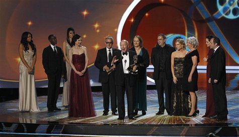 Writer Julian Fellowes accepts the award for outstanding miniseries or movie for "Downton Abbey," at the 63rd Primetime Emmy Awards in Los A Writer Julian Fellowes accepts the award for outstanding miniseries or movie for "Downton Abbey," at the 63rd Primetime Emmy Awards in Los A