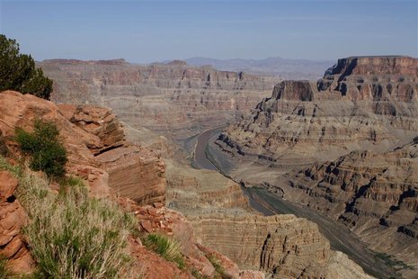 The Colorado River flows through the Grand Canyon on the Hualapai Indian Reservation near Peach Springs The Colorado River flows through the Grand Canyon on the Hualapai Indian Reservation near Peach Springs