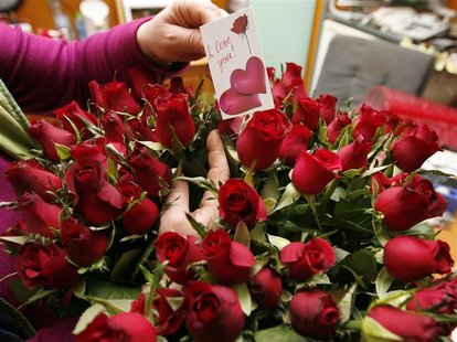 A florist prepares roses for Valentine's Day at a flower shop in Tirana A florist prepares roses for Valentine's Day at a flower shop in Tirana