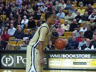 Broncos fall 69-66 to Akron as Mike Douglas becomes the all-time leader in assists in Western Michigan University history.