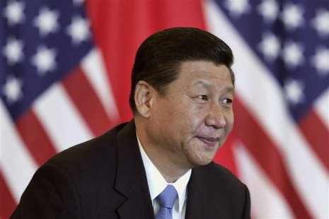 File photo of China's Vice President Xi Jinping smiling during a discussion with U.S. and Chinese business leaders at Beijing Hotel File photo of China's Vice President Xi Jinping smiling during a discussion with U.S. and Chinese business leaders at Beijing Hotel