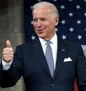 Vice President Biden gives a thumbs-up before President Obama's State of the Union address to a joint session of Congress on Capitol Hill in