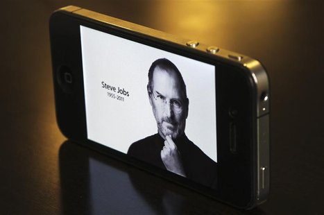 The main Apple Inc website featuring Apple co-founder Steve Jobs is seen on an iPhone in this photo illustration taken in Central Sydney The main Apple Inc website featuring Apple co-founder Steve Jobs is seen on an iPhone in this photo illustration taken in Central Sydney