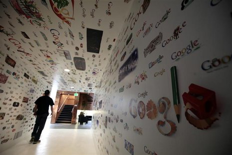A man walks through a tunnel of Google homepage logos at the Google campus near Venice Beach, in Los Angeles A man walks through a tunnel of Google homepage logos at the Google campus near Venice Beach, in Los Angeles