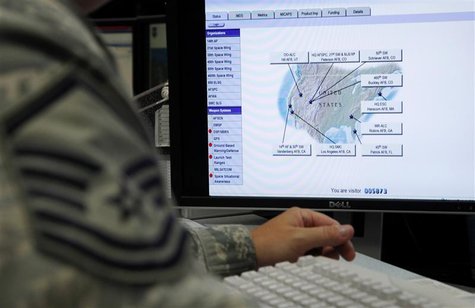 A map is displayed on one of the screens at the Air Force Space Command Network Operations & Security Center at Peterson Air Force Base in C