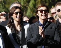 McCartney applauds next to his wife Nancy Shevell before unveiling his star on the Walk of Fame in Hollywood