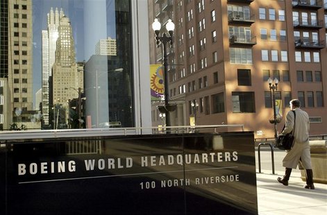 A pedestrian walks past the Boeing World Headquarters office building in Chicago April 26, 2006. A pedestrian walks past the Boeing World Headquarters office building in Chicago April 26, 2006.