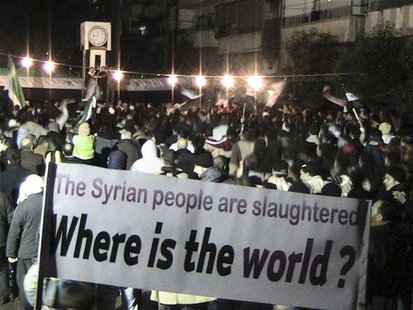 Demonstrators gather during a protest against Syria's President Bashar al-Assad in Homs Demonstrators gather during a protest against Syria's President Bashar al-Assad in Homs